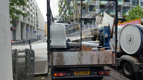 Professional waste management team handling construction waste